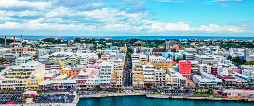 An aerial view of a town with colorful buildings.